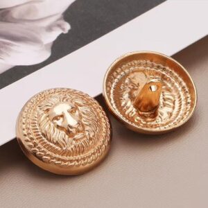 Bouton doré inoxydable tête de lion